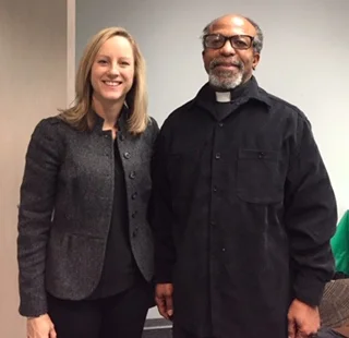 Kathy Kraninger, CFPB Director listens to Rev. Killings discuss why the faith community support consumer protections from exploitative payday loans.