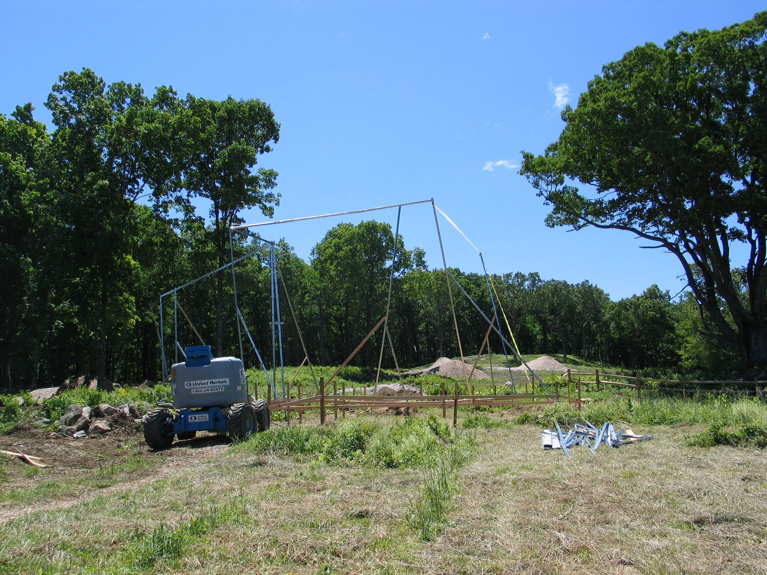  So, after CNR built a full-size mock-up of the framed apertures using a cherry-picker and 2x4s, the owners stood in the "windows" and did not see their trees!  Solution?&nbsp;Rotate the entire structure 15 degrees and raise it 2 feet. 