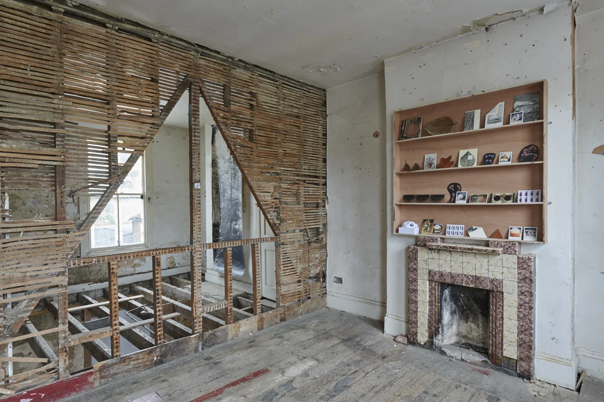 A collaborative shelf of posted and small works, by the five artists in APPPARATUS.