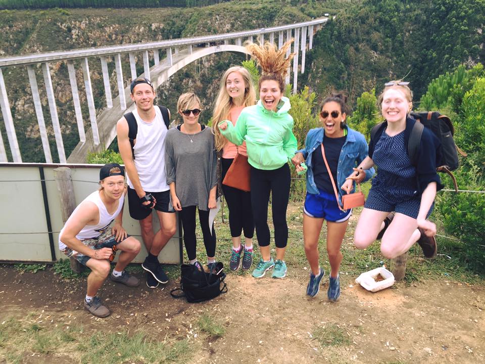 Group of friends after jumping off the Bloukrans bridge (pictured behind us) 