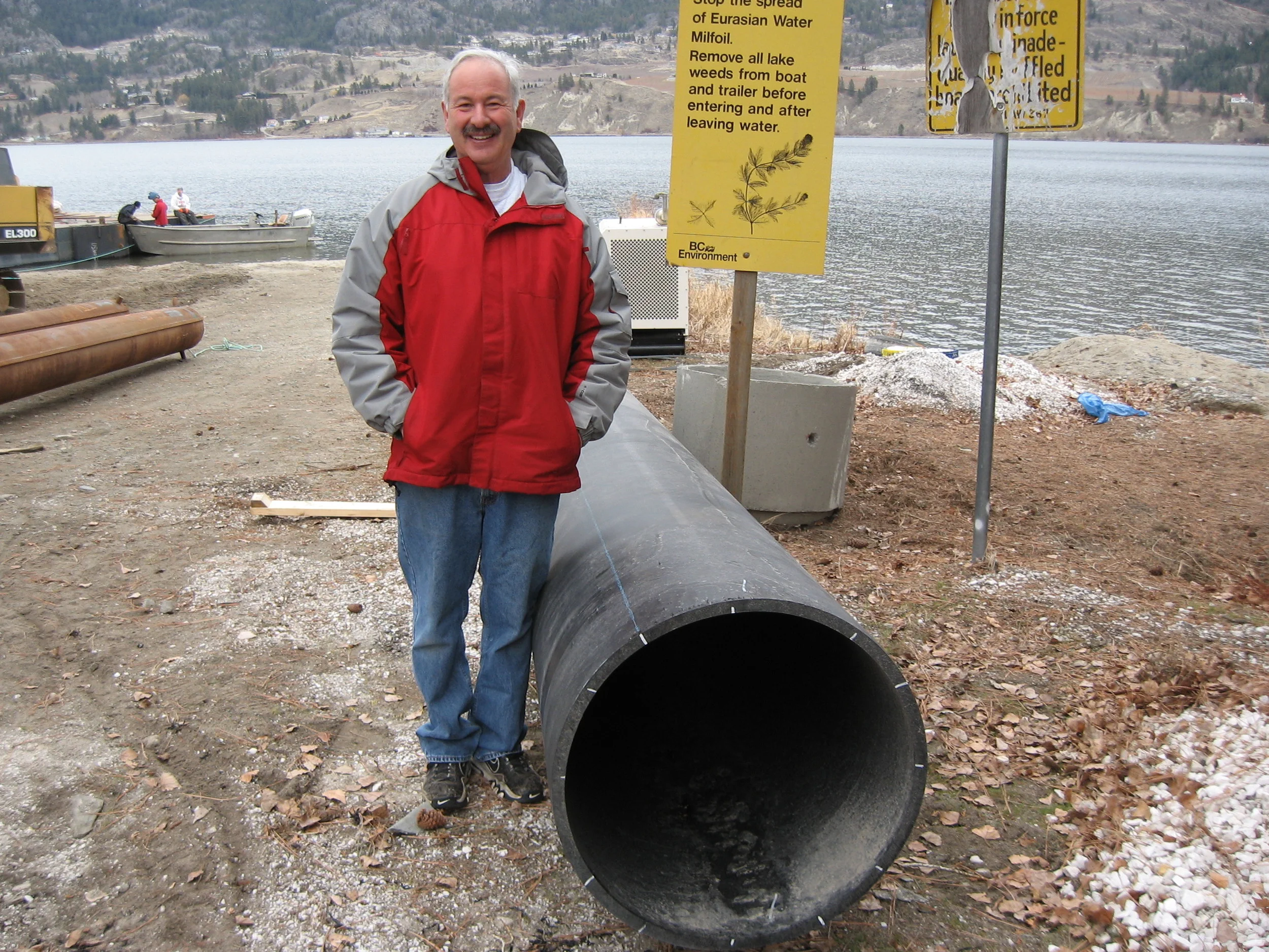  TRUSTEE BERCHOWITZ SHOWING THE 28" INTAKE PIPE 