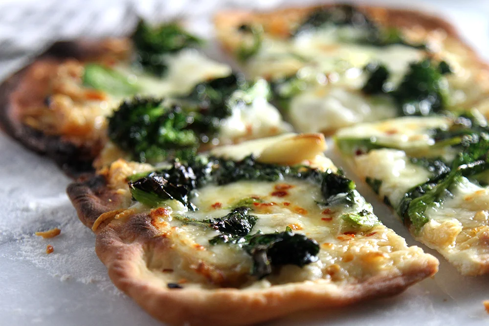 WHITE PIZZA WITH RAPINI AND ROASTED GARLIC