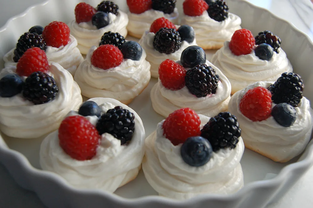 BERRIES AND CREAM IN A NEST