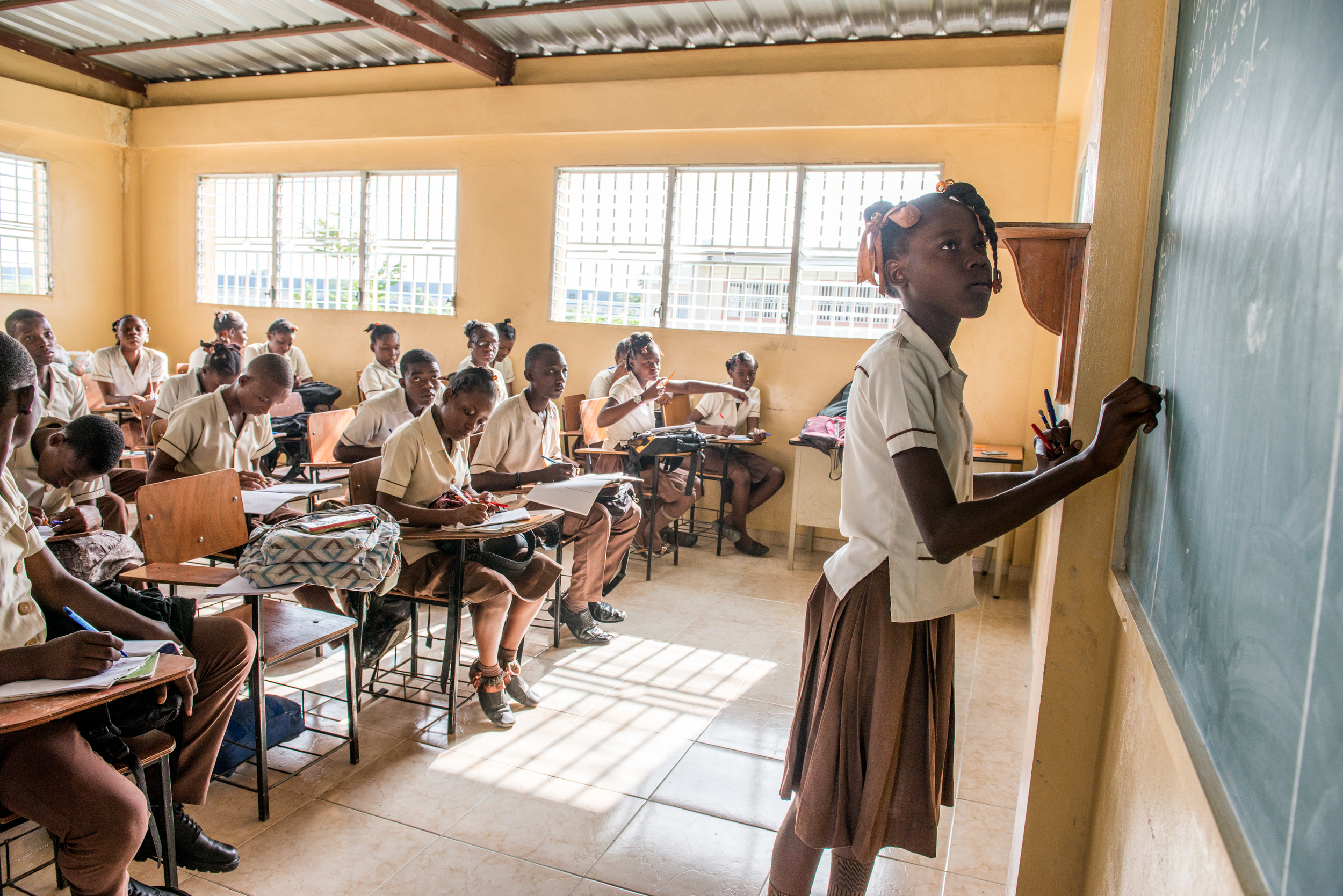 Students practice their lessons in a Fondation St Luc classroom.
