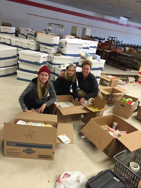 Students work at sorting donations at a holding warehouse in Pennsylvania