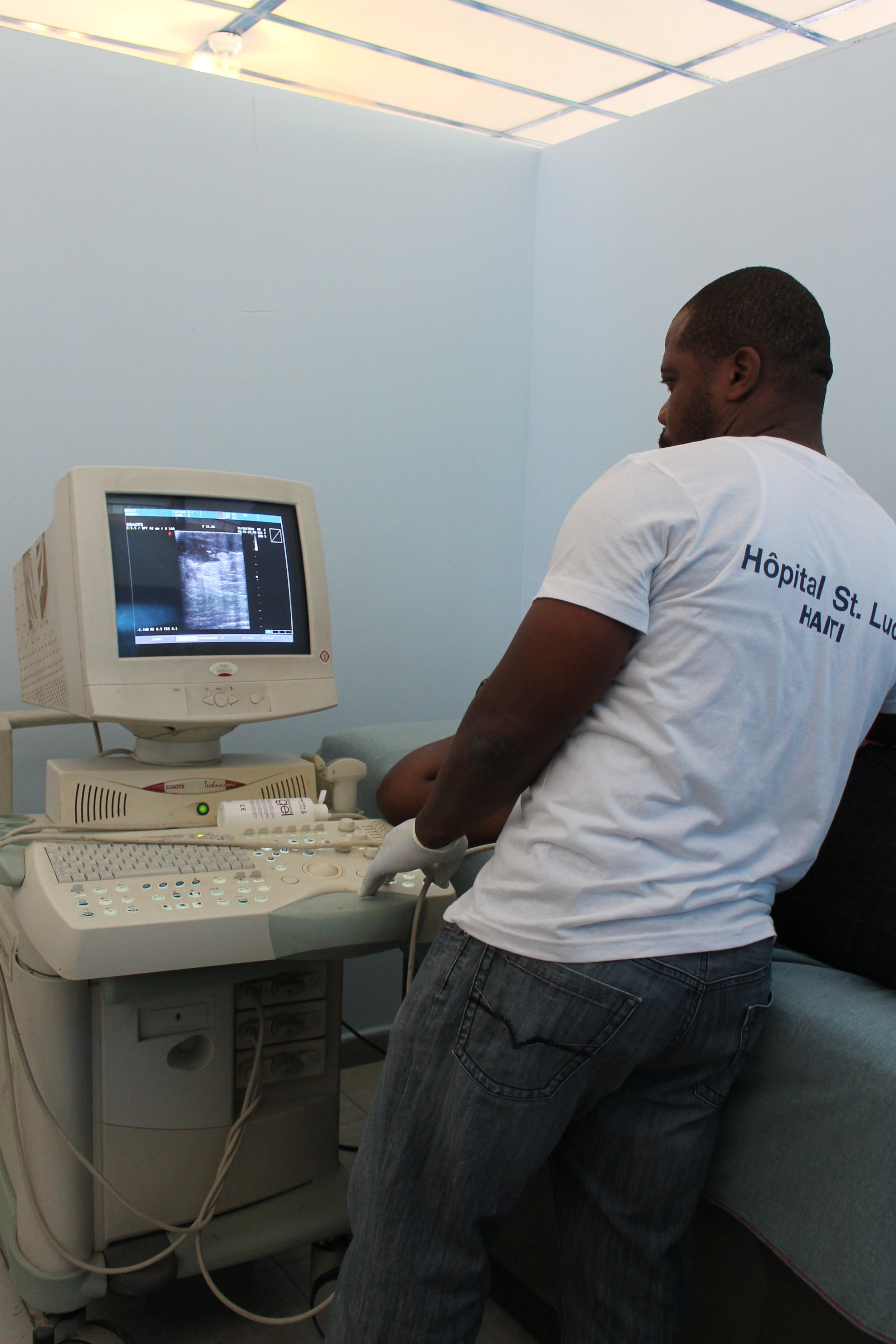  Dr. Pyram performs an ultrasound screening. 