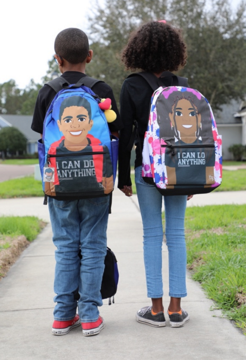 Carter Mitchell (age 9) and Ella Weaver (age 10) stop for a quick photo while walking home from school with their Blended Designs backpacks.