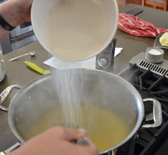 Adding sugar to the bubbly goodness.