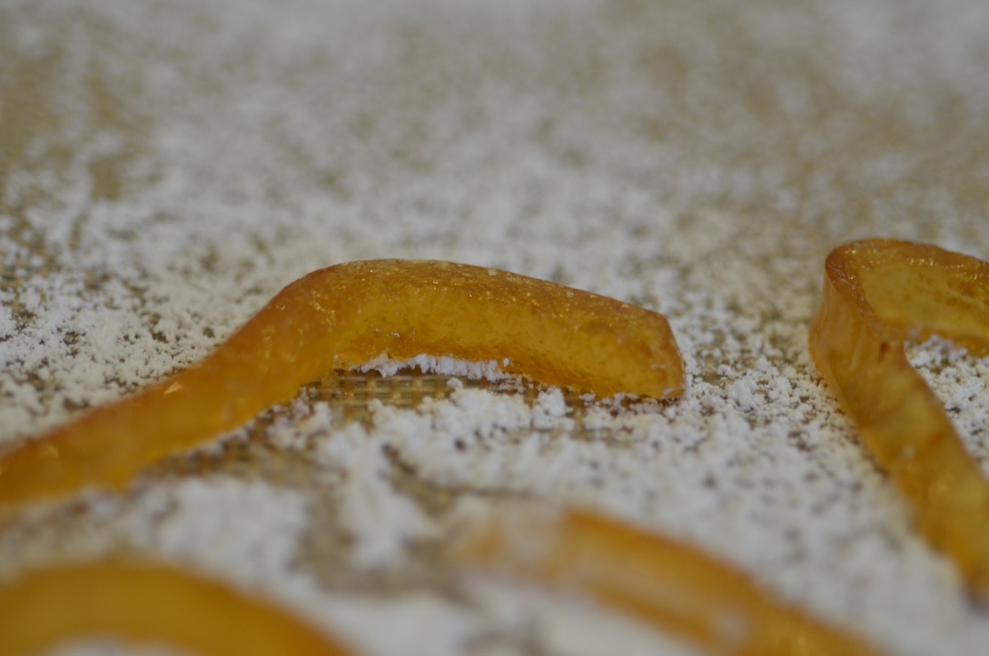 I do have a slight sprinkling of powdered sugar down on the silicon mat here. as an experiment. It didn't help with the sticking issue. 
