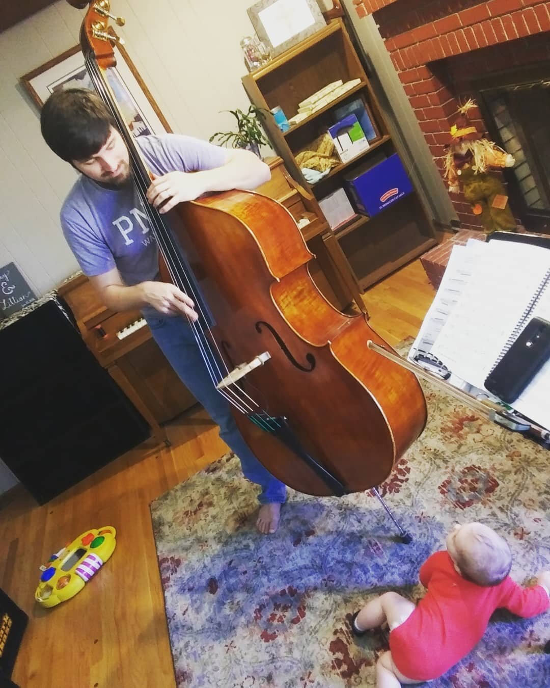 Luca is continuing the Panella baby tradition of crawling up amd playing under my bass while practicing. Alessandra used to do the same at this age! #kcmusic #livejazzkc #bass #bassist #musicianlife #practicing #dadlife