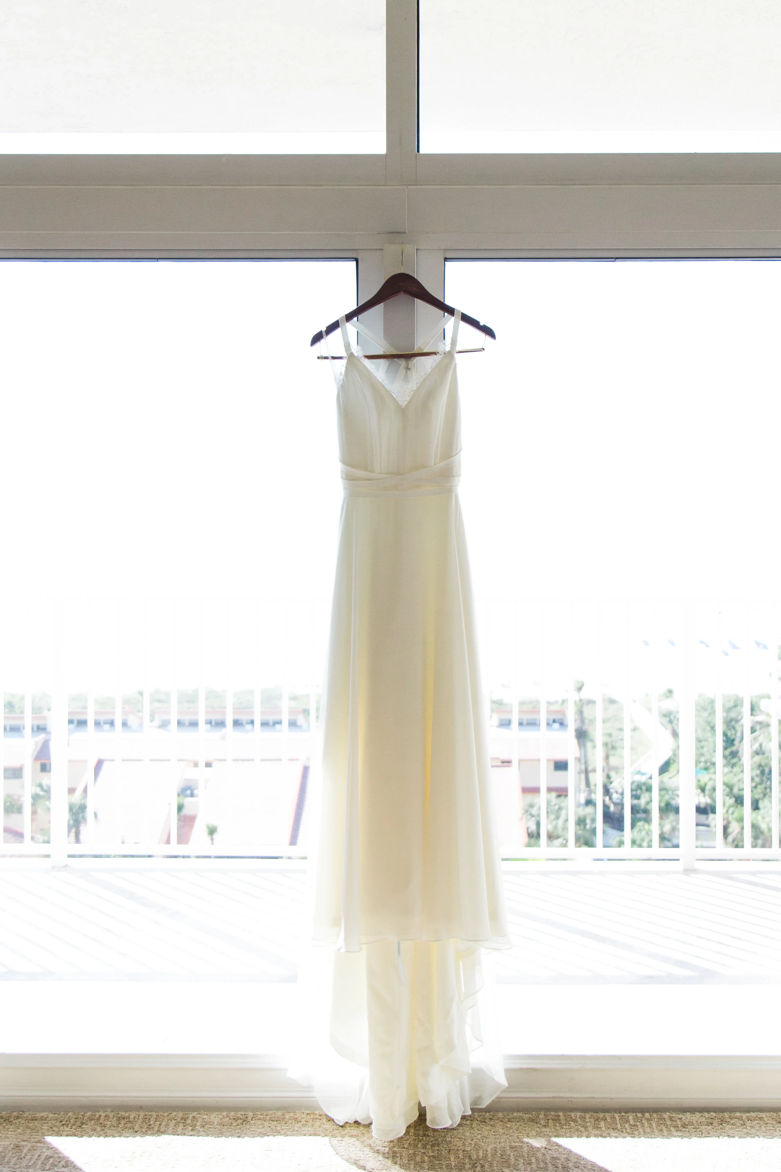 Beautiful, sunny, and intimate Florida beach wedding at Sunset. Documentary Wedding photographer for the genuine couple in love.