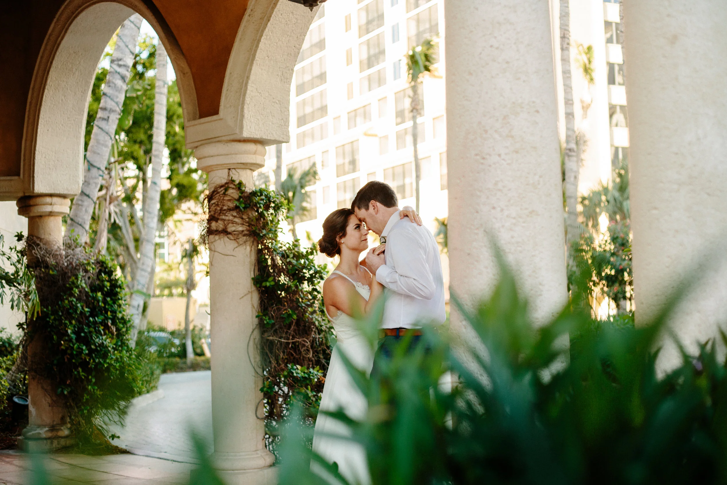 Beautiful, sunny, and intimate Florida beach wedding at Sunset. Documentary Wedding photographer for the genuine couple in love.