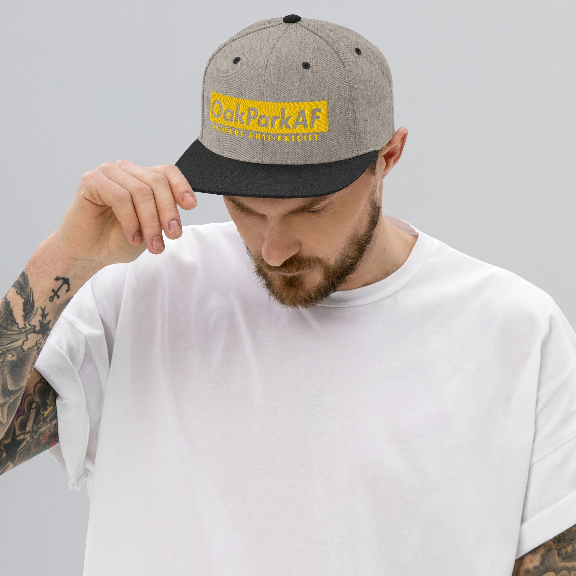 classic-snapback-heather-black-front-68f6d509bb99c.jpg