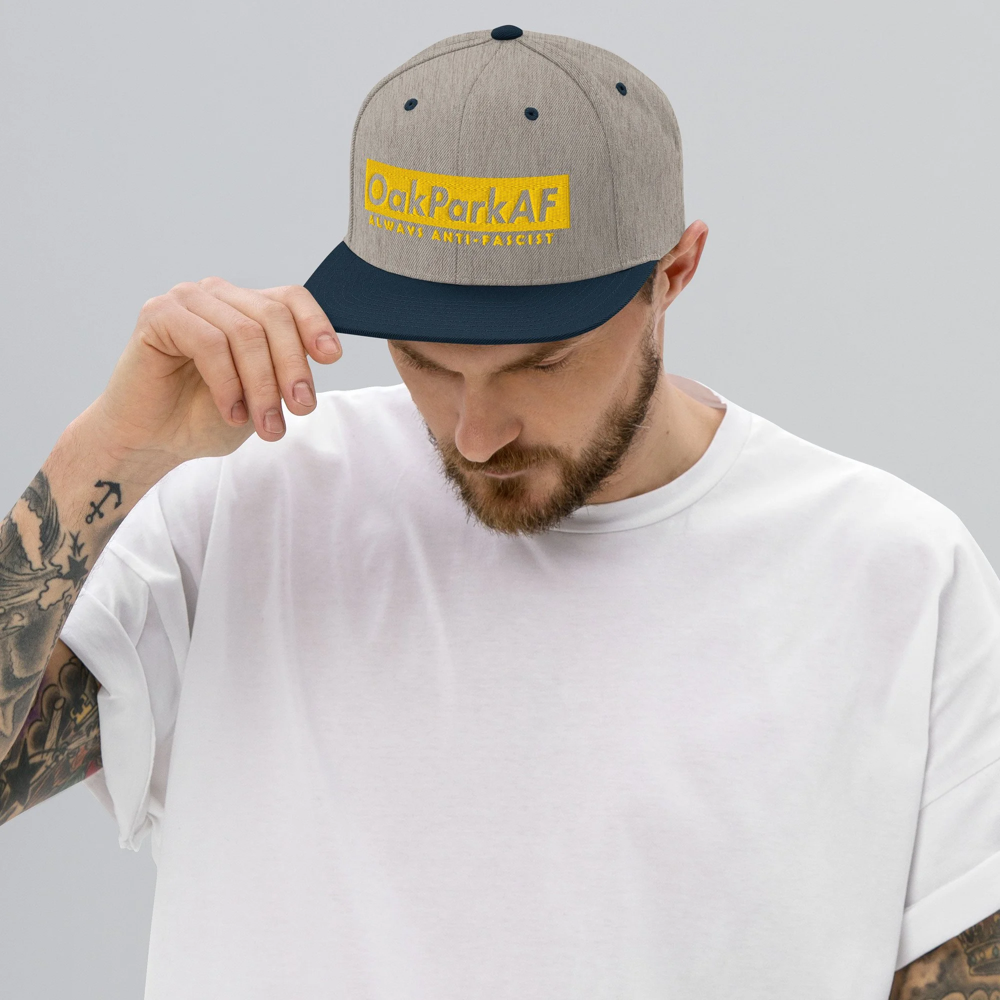 classic-snapback-heather-grey-navy-front-68f6d509bc11c.jpg
