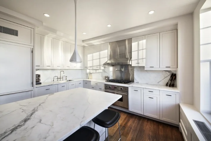 31 west 11th- white kitchen marble island.jpeg