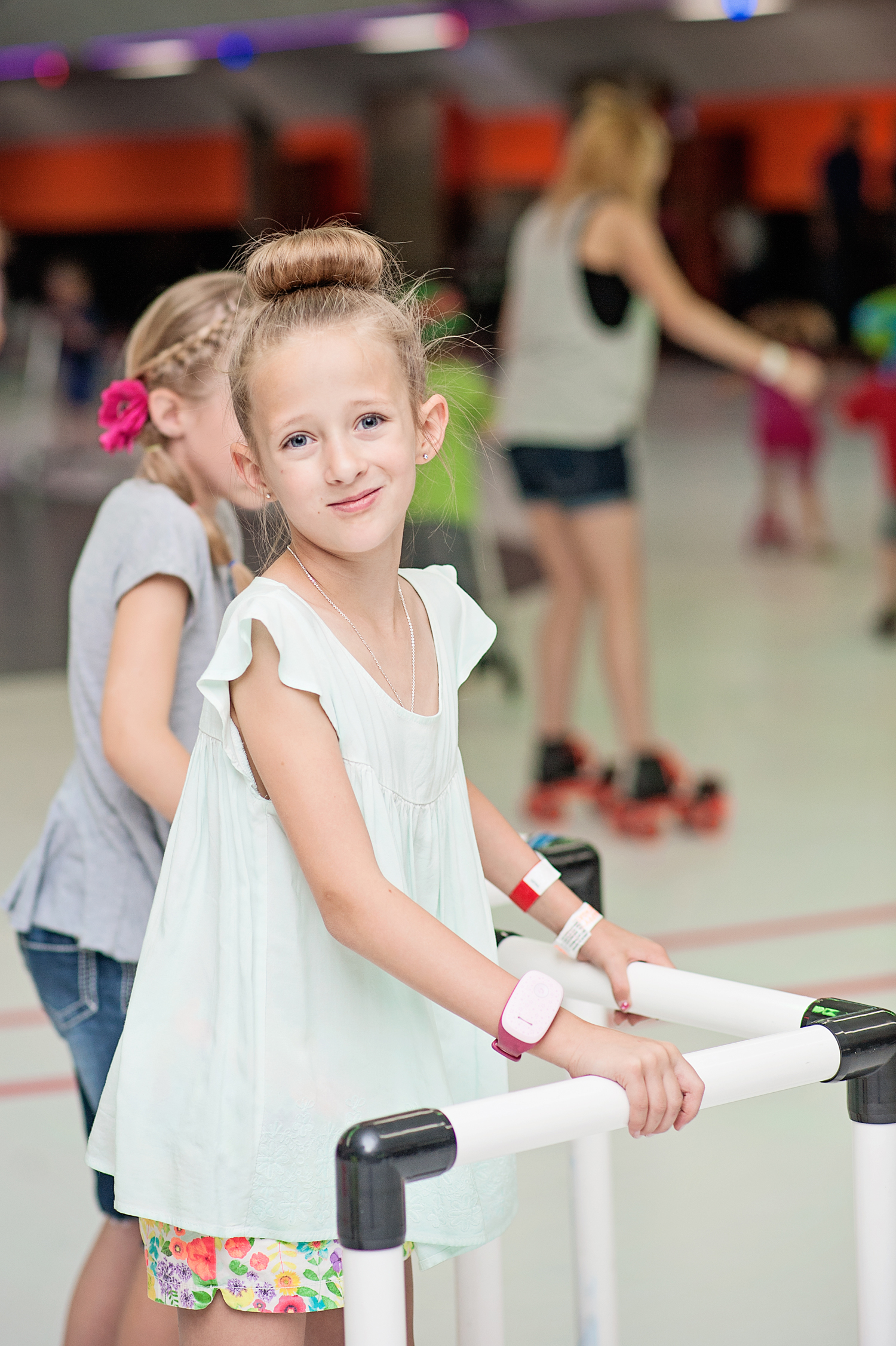  Girl had fun skating with a roller skate walker 