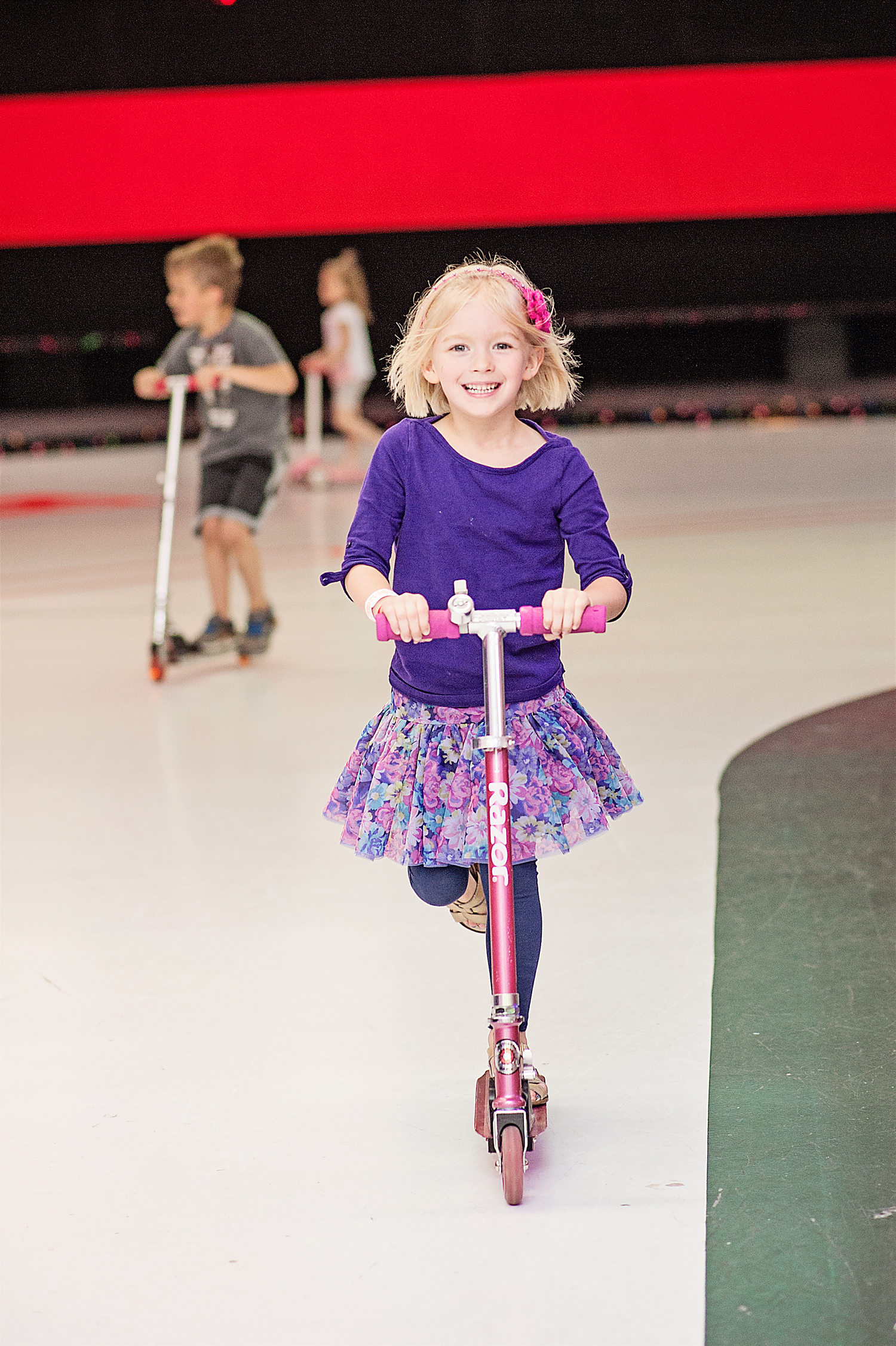  young girl enjoying scootering  