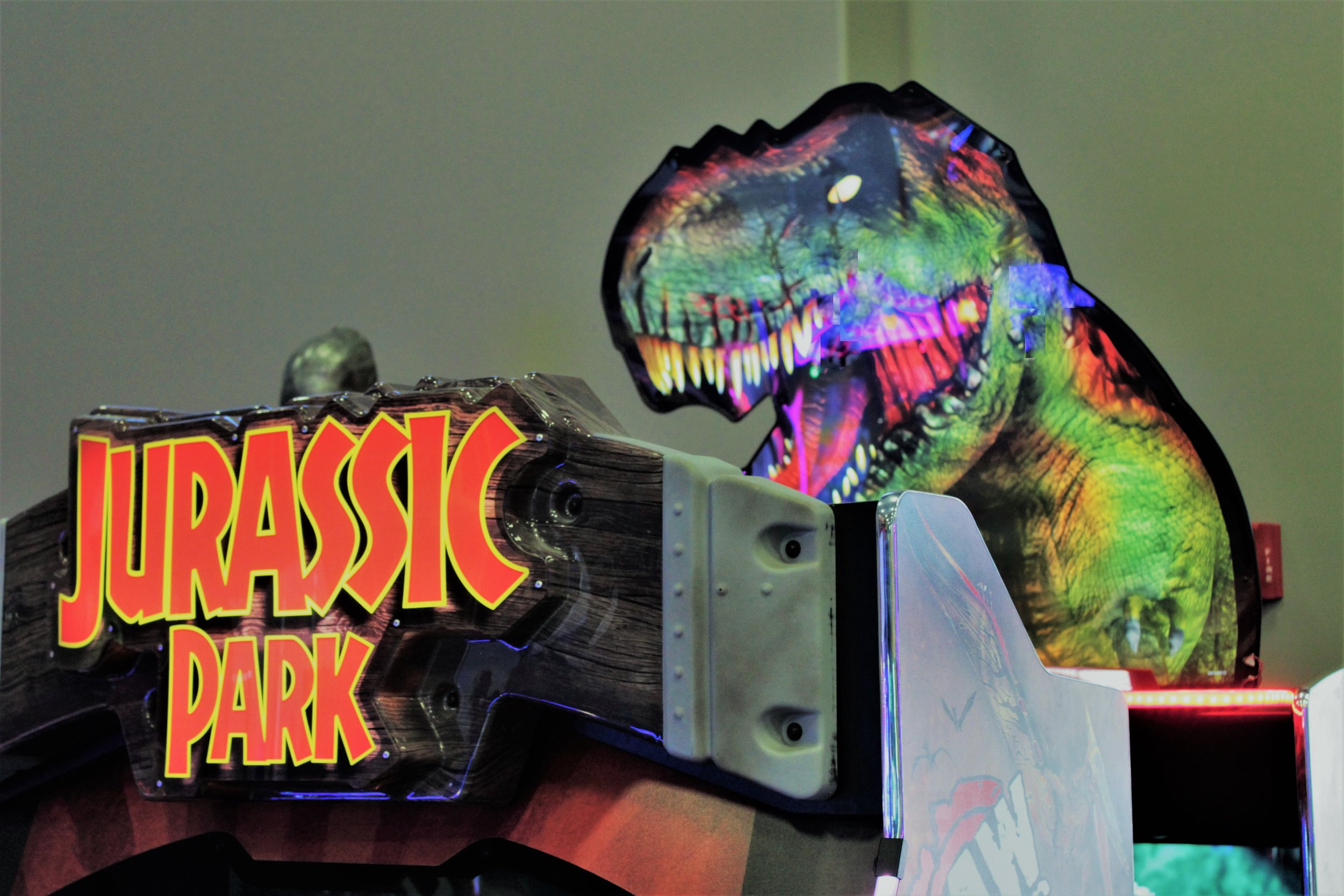  t-rex sign on the jurassic park light shooting game 
