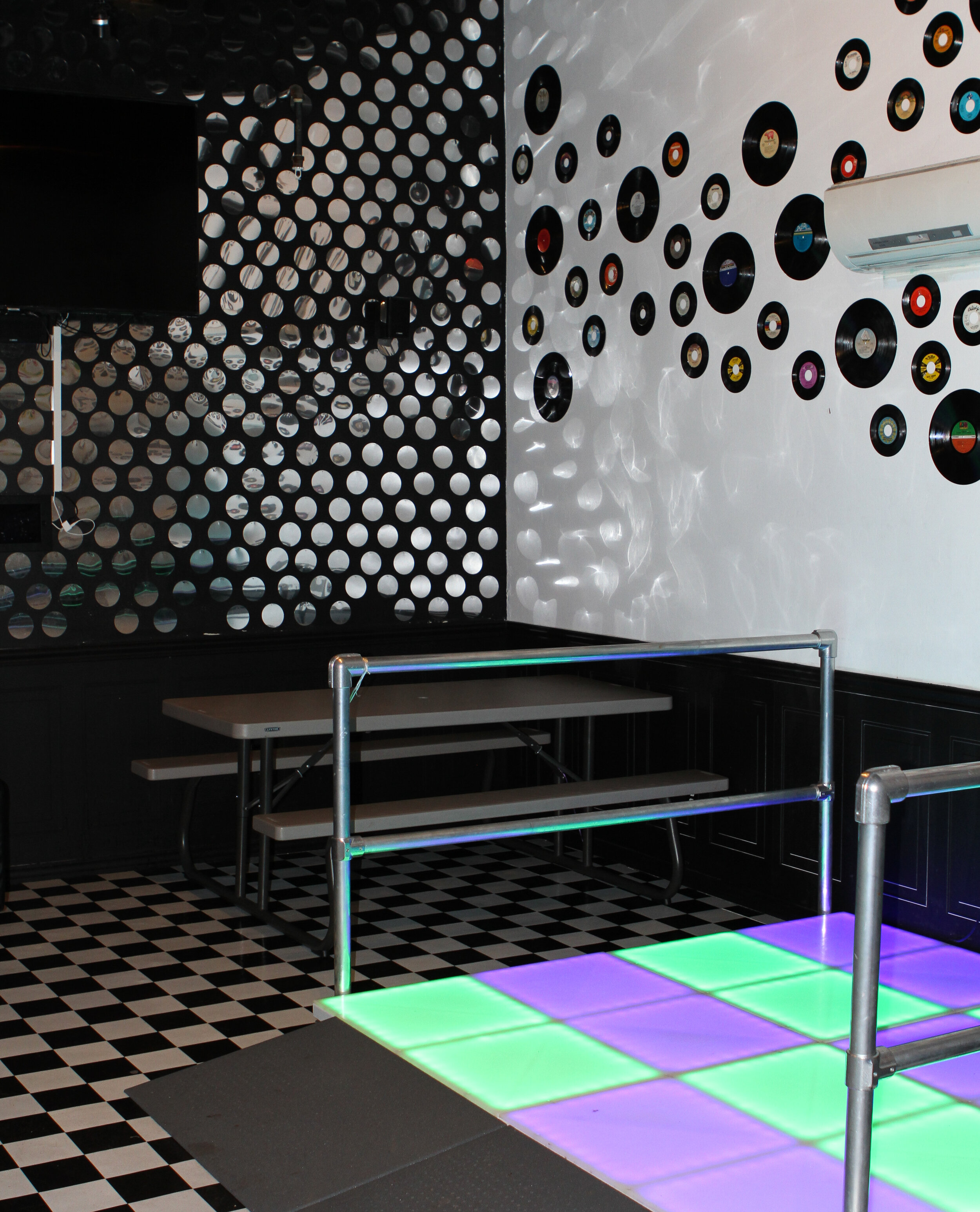  mini light up disco floor in a disco decorated birthday party room 