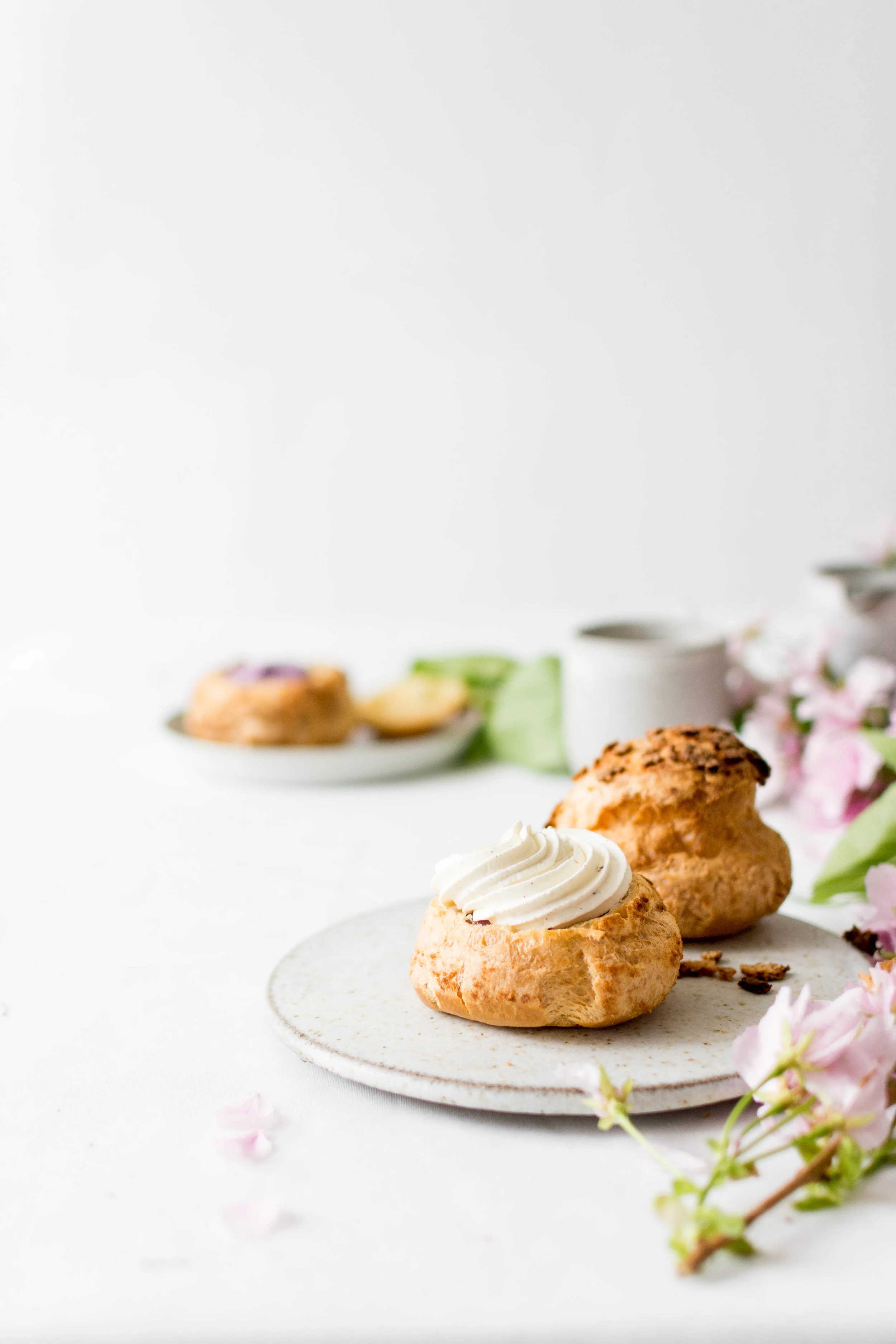 choux craquelin w/ blackcurrant crème pâtissière & vanilla bean whipped cream