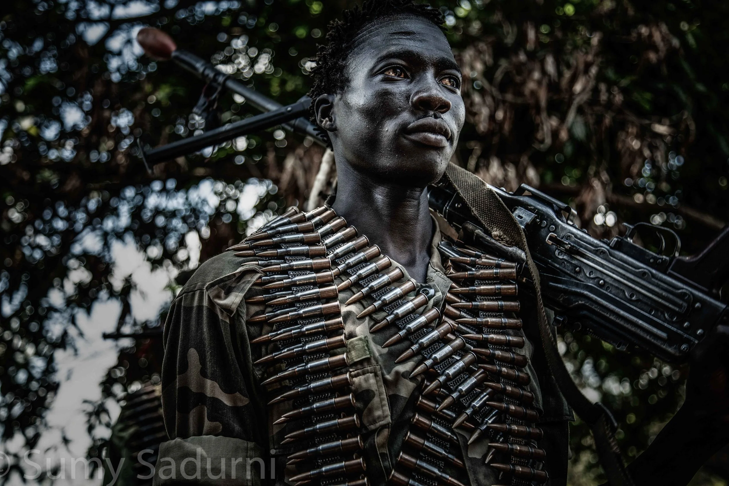 Print 4: A rebel fighter from the Sudan People’s Liberation Army - In Opposition (SPLA-IO) prepares to be deployed to the frontline in Panyume, South Sudan.
