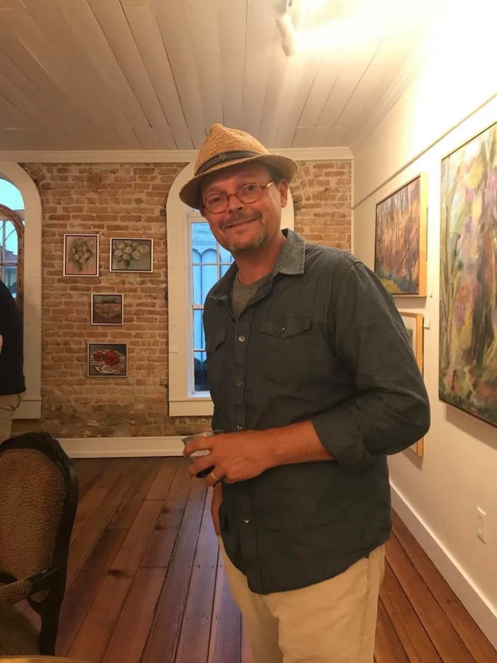 Trahern Cook - Trahern Cook is a plein air artist who has become a part of the Columbia area arts events landscape by setting up his easel, popping on his porkpie hat, and painting the life of the city. Trahern had this to say about his work over the past 15 months: “I have the privilege of getting up every day and painting. I paint in my hometown and all over the United States. Connecting with people where they are and sharing their stories through my paintings is what speaks to my soul right now. My paintings are experiential and relational. I endeavor to find and share sanctuary with as many of my fellow citizens as possible. In the last year the easel has been my old wooden vessel that's carried me to many different sanctuaries, but all tell a uniting story. That most of us are all looking for the same thing; love, friendship, family, and a place to chill for a bit to mend the soul. When I can share that through my work, there's no greater fulfillment.”