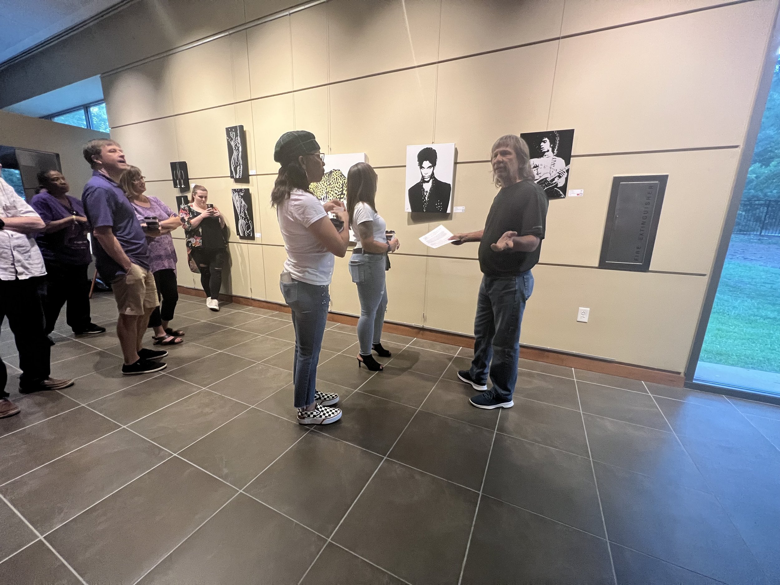 Steven White speaking to theatre goers at Harbison Theatre 