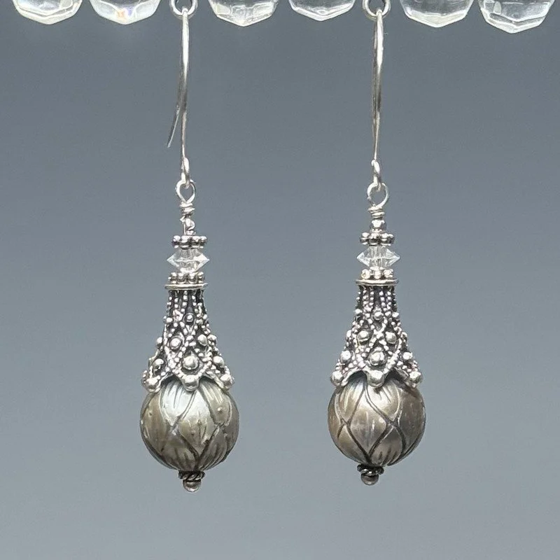 Carved Tahitian pearl dangles