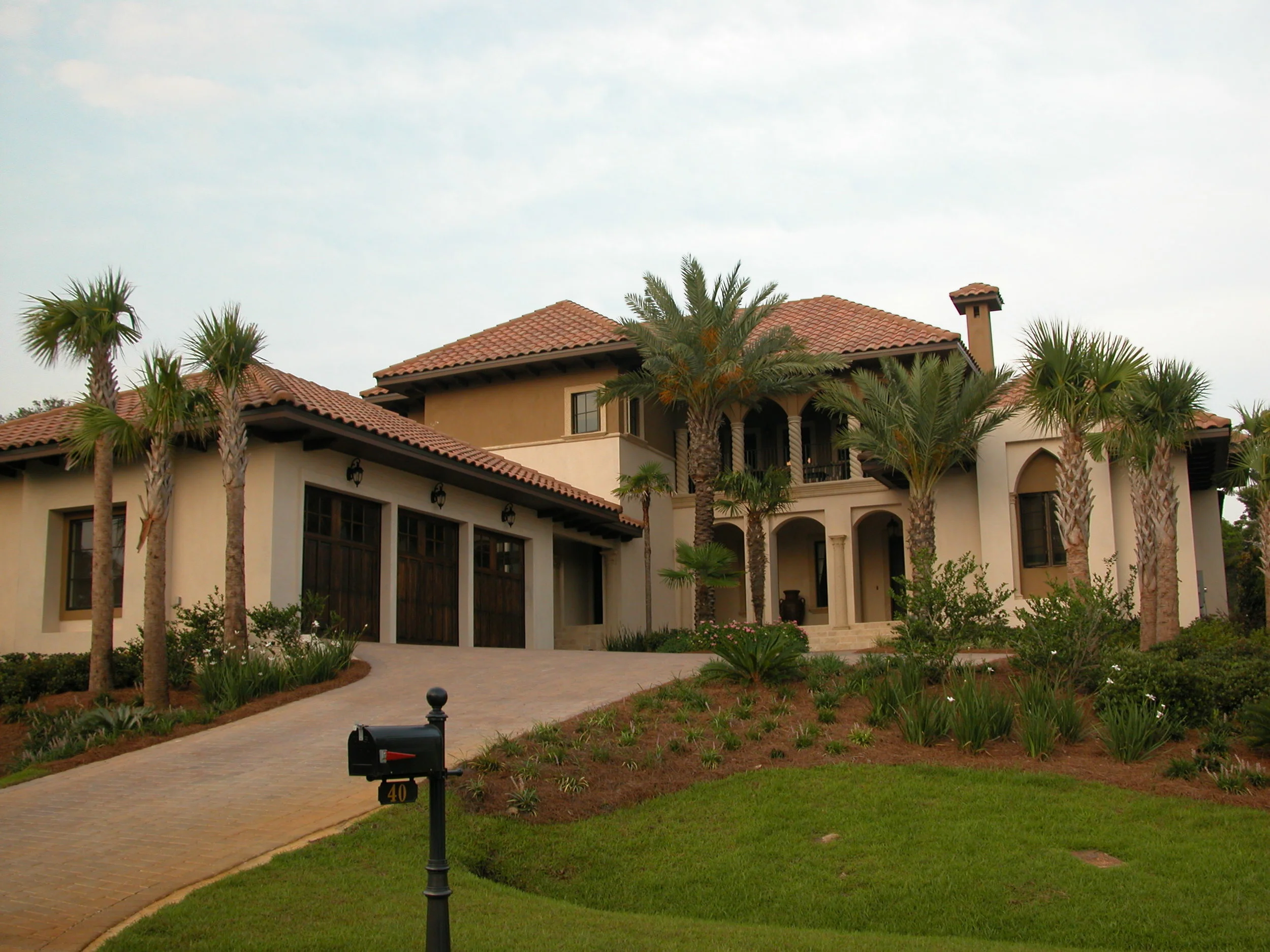 Britenbach Residence, Gulf Place, FloridaThis residence was influenced by the blended Italian-Spanish architecture of Palm Beach. The front is dominated by a two story, columned loggia with subtle, Venetian references