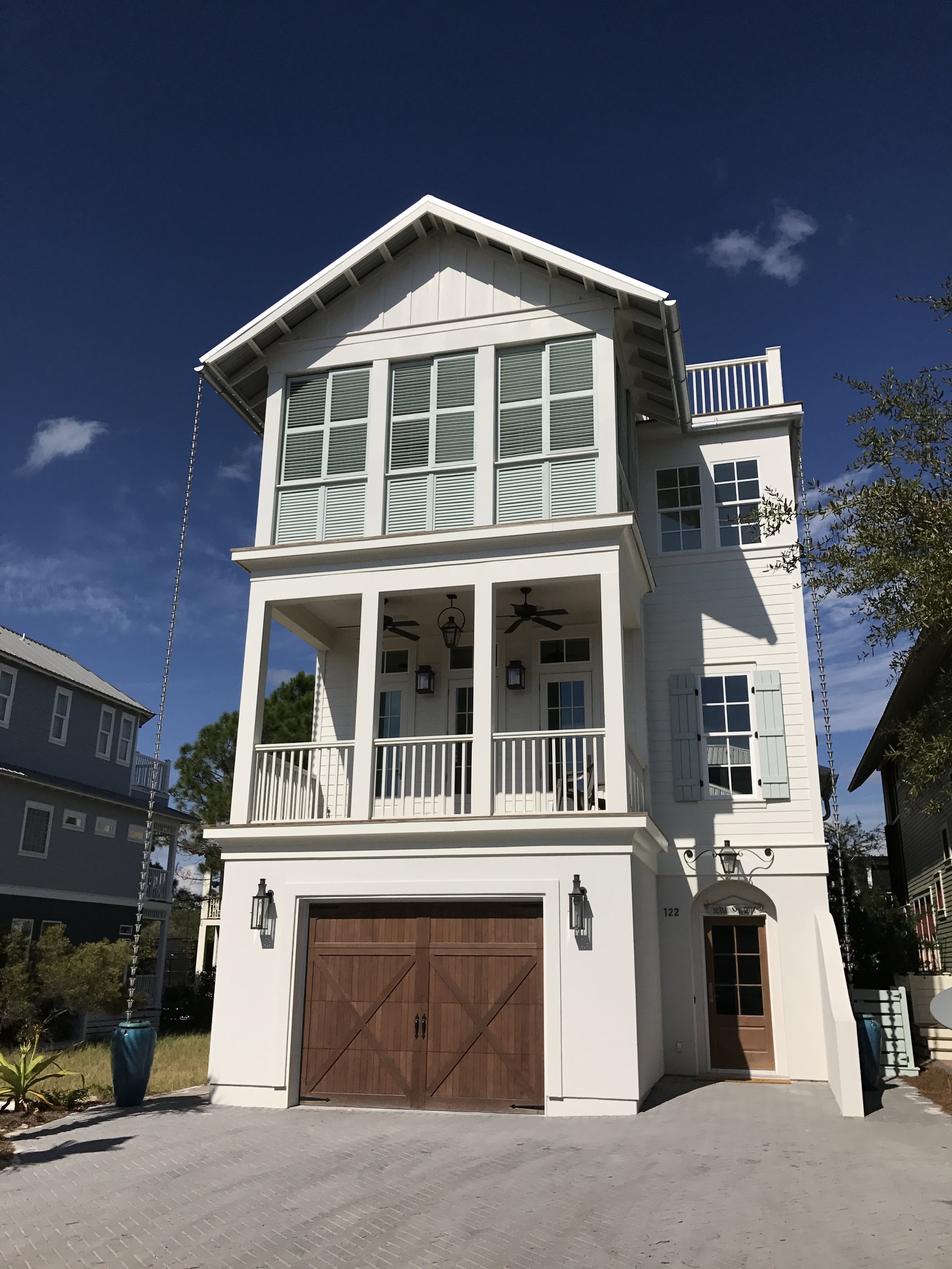 Calvani ResidenceThis project was designed for a narrow lot in the Seacrest Beach  community of South Walton County. The floorplan includes a main  Living/Dining/Kitchen space on the second floor with a Master Bedroom  Suite on the top floor