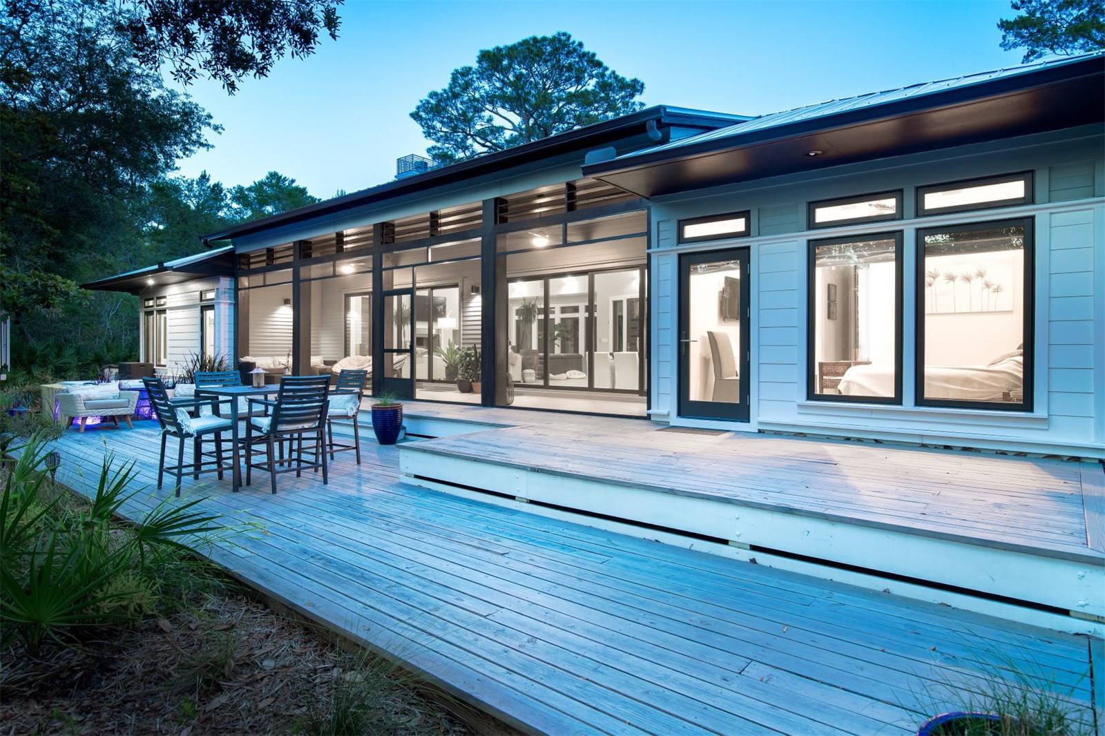 Courtney ResidenceThe primary concern with this residence was the desire to create a harmonious balance with the natural setting. The house responds to the strong vertical lines of the trees by expressing a strong horizontal character as a contrast