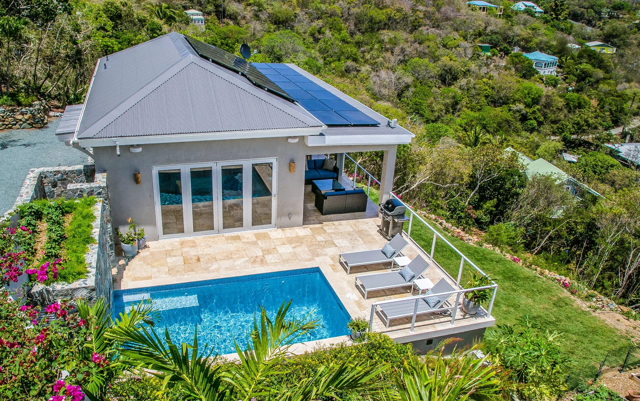 Woltkamp-Coffey ResidenceSituated on a hill overlooking the Caribbean Sea to the south, this  residence is a modern Caribbean home with a nod to the traditional  Danish colonial structures found in the Virgin Islands