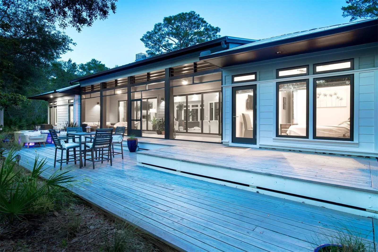 Courtney ResidenceThe primary concern with this residence was the desire to create a harmonious balance with the natural setting. The house responds to the strong vertical lines of the trees by expressing a strong horizontal character as a contrast