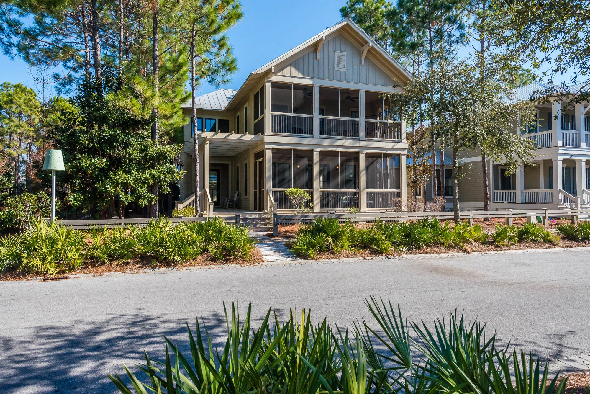 Lot 13, Cypress CoveThis residence is located adjacent to a small park allowing the addition of a large, semi-private courtyard and outdoor eating area along its side