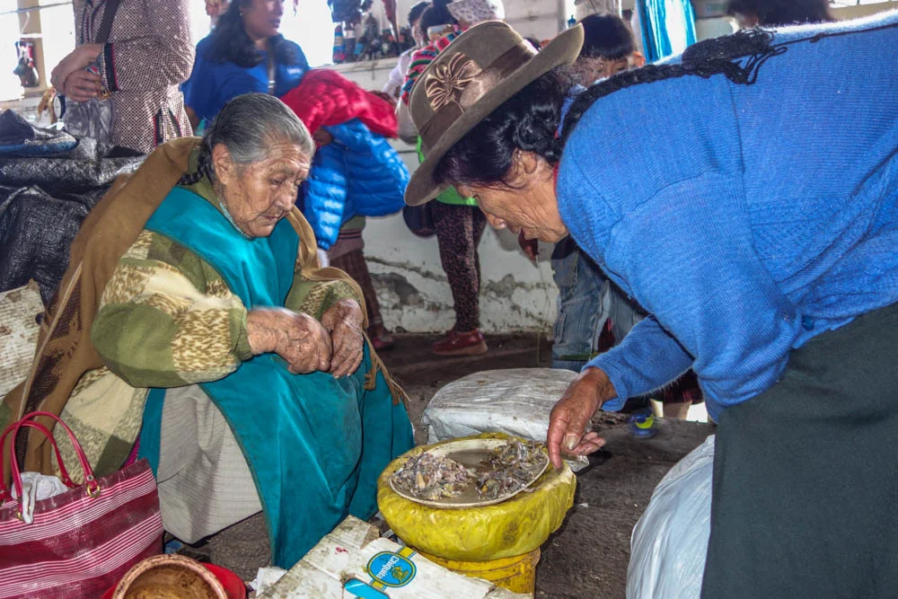 Local women buying frogs which are supposed to be good for curing anemia