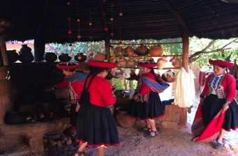 Local women preparing for a weaving demonstration at Chinchero