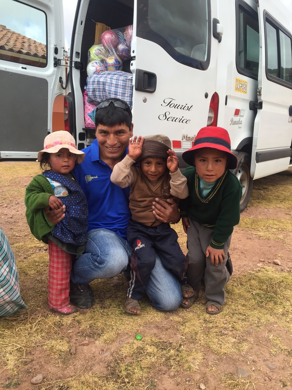 Delivering shoes, supplies and balls to a school near Maras.