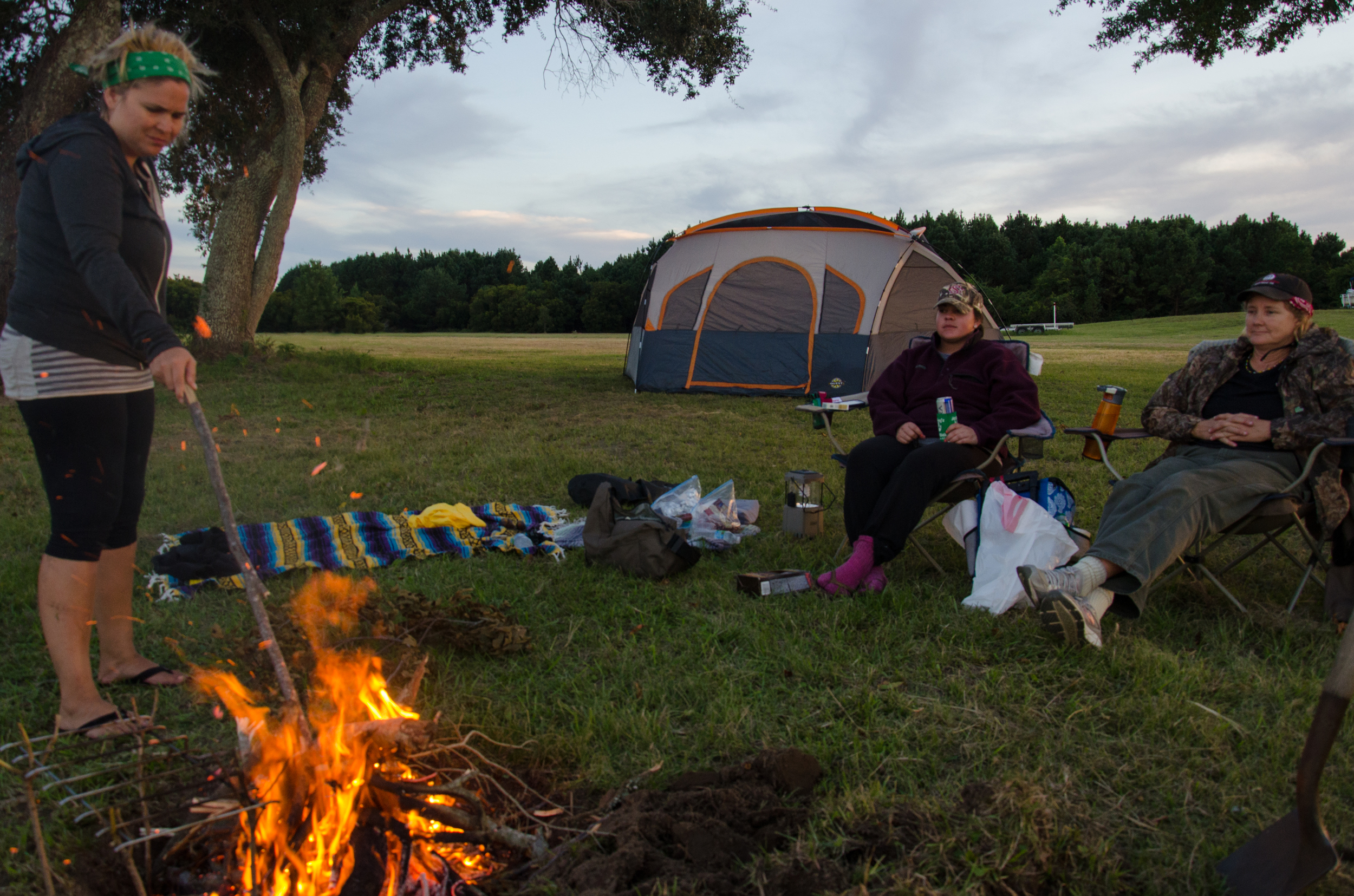 Prepping to cook over campfire at Westbank.