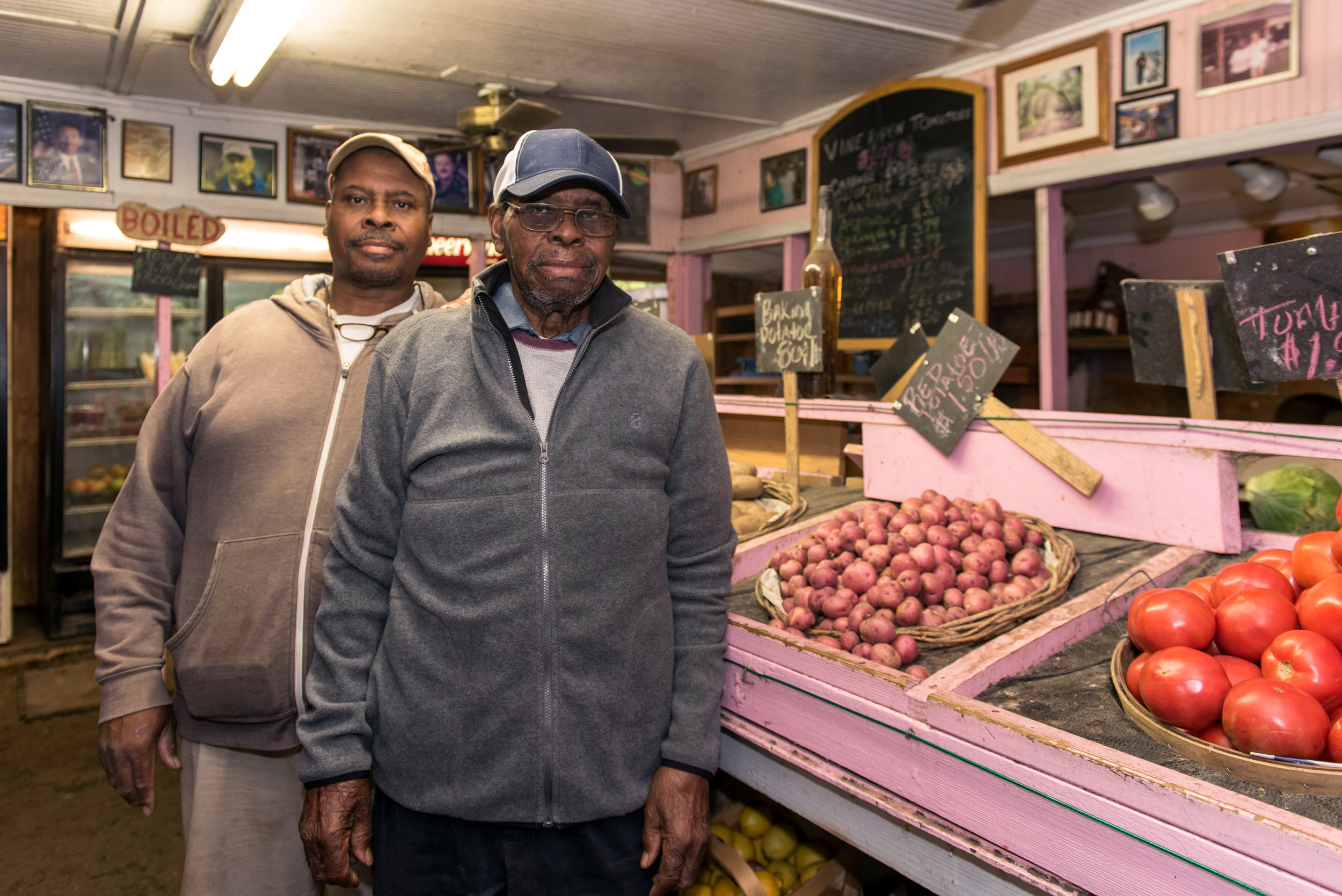 Father and son, George and Robert Brown inside the market at George & Pink’s.