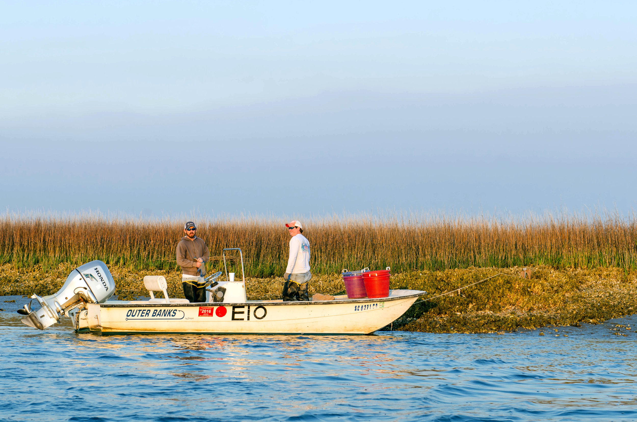 Jimmy and Ashley anchored to an oyster bed, Edisto Island, SC.