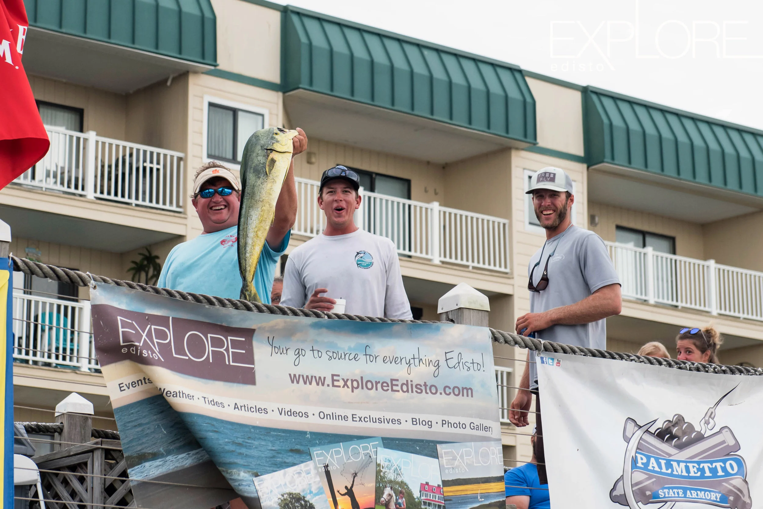 Fisherman show off dolphin at the SC Governors Cup Billfishing tournament.