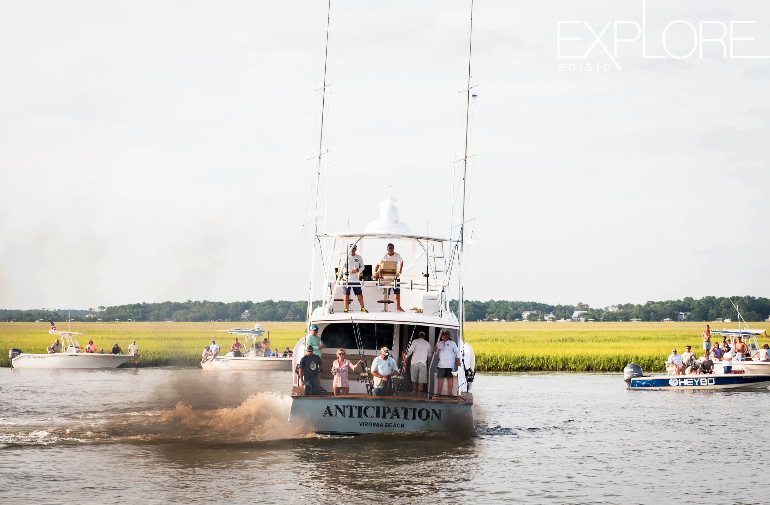 Smoke billowing around boat as it turns to dock.