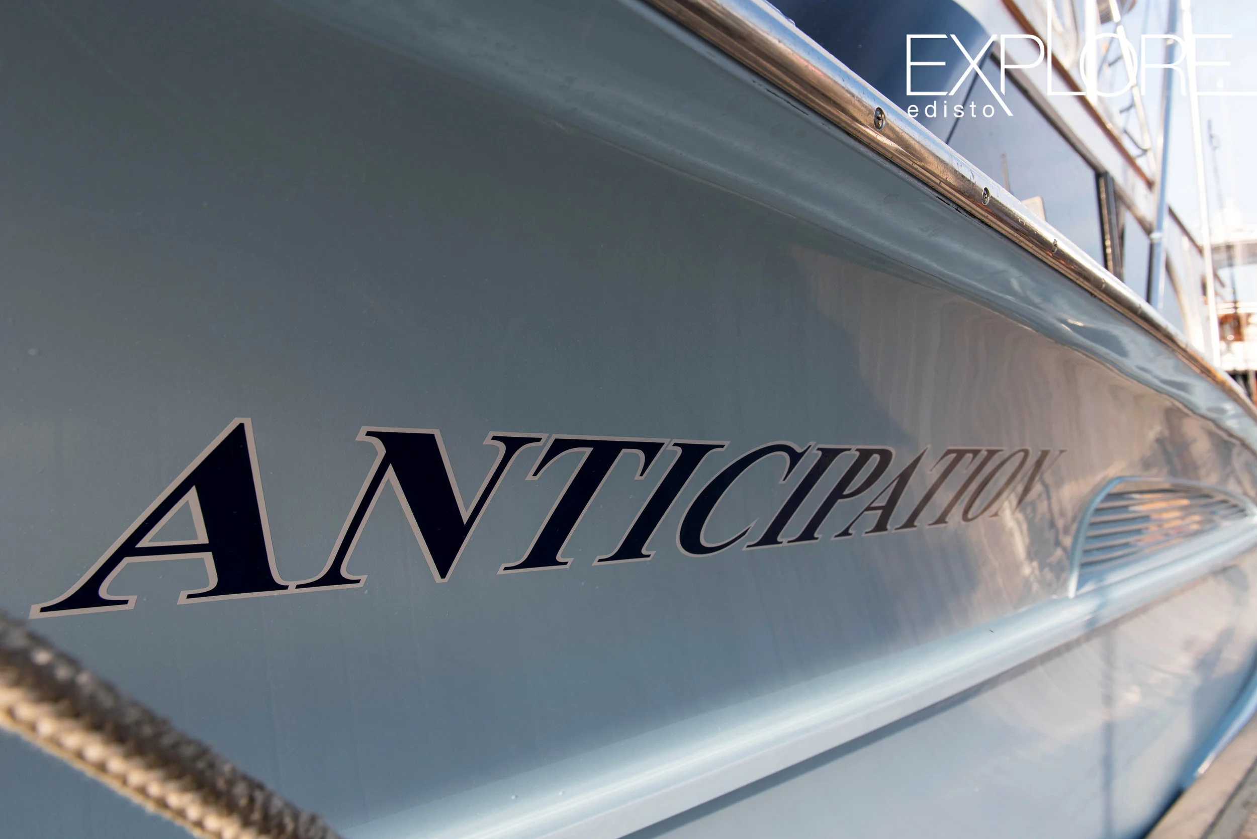 Anticipation, lettering down side of boat.