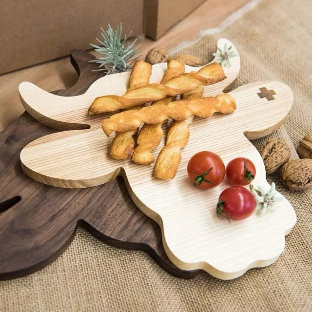 It&rsquo;s ap&eacute;ro season! Wooden cow cutting boards are back in stock!
.
.
.
#boutique #swissstyle #plancheapero #vachementsuisse #swissdesign #swissmade #cuttingboard #cowcuttingboard #shopsmall #shoplocal #sustainabledesign #supportlocals #su