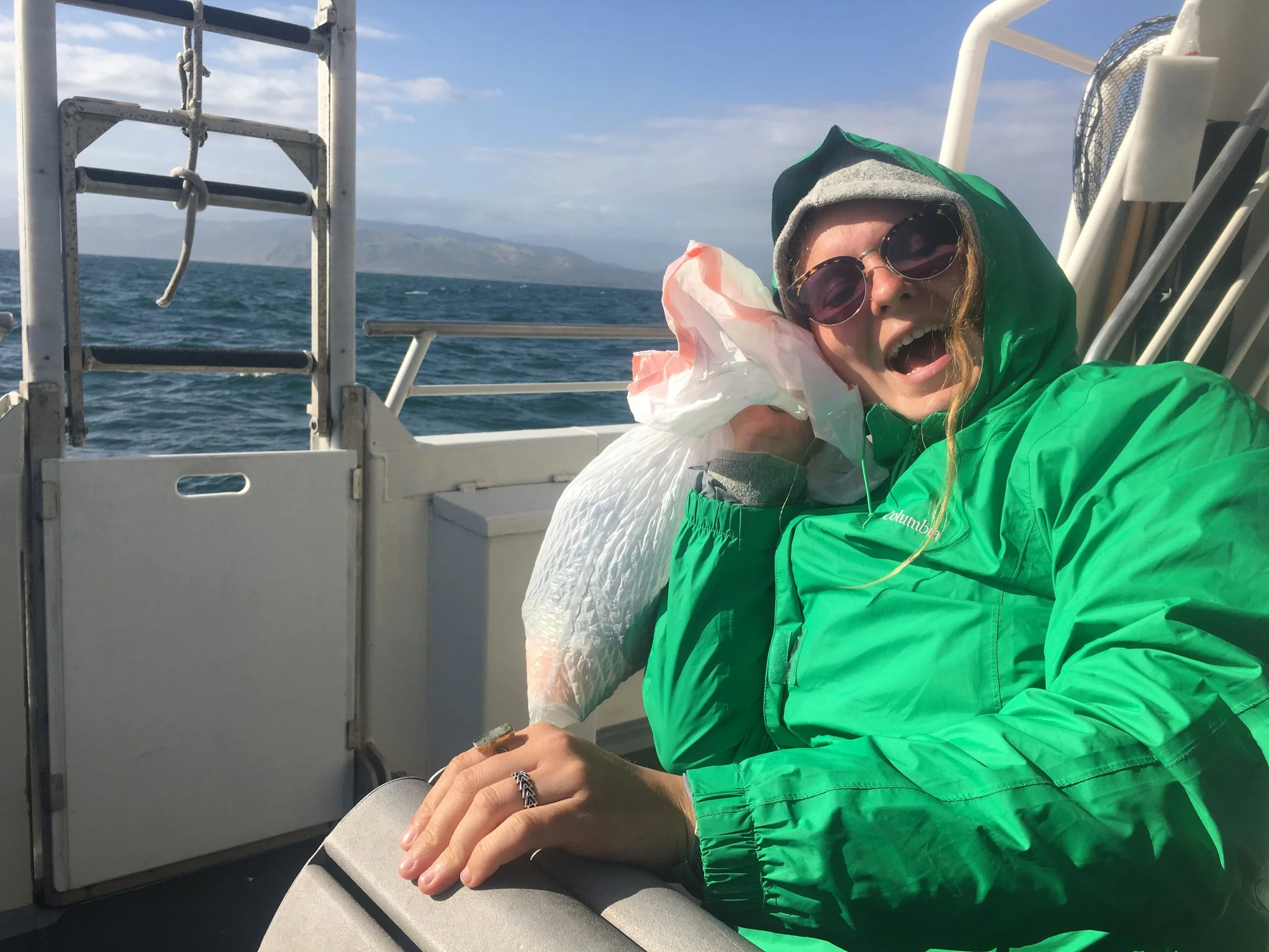 On the ferry back to Ventura lovingly holding my trash.
