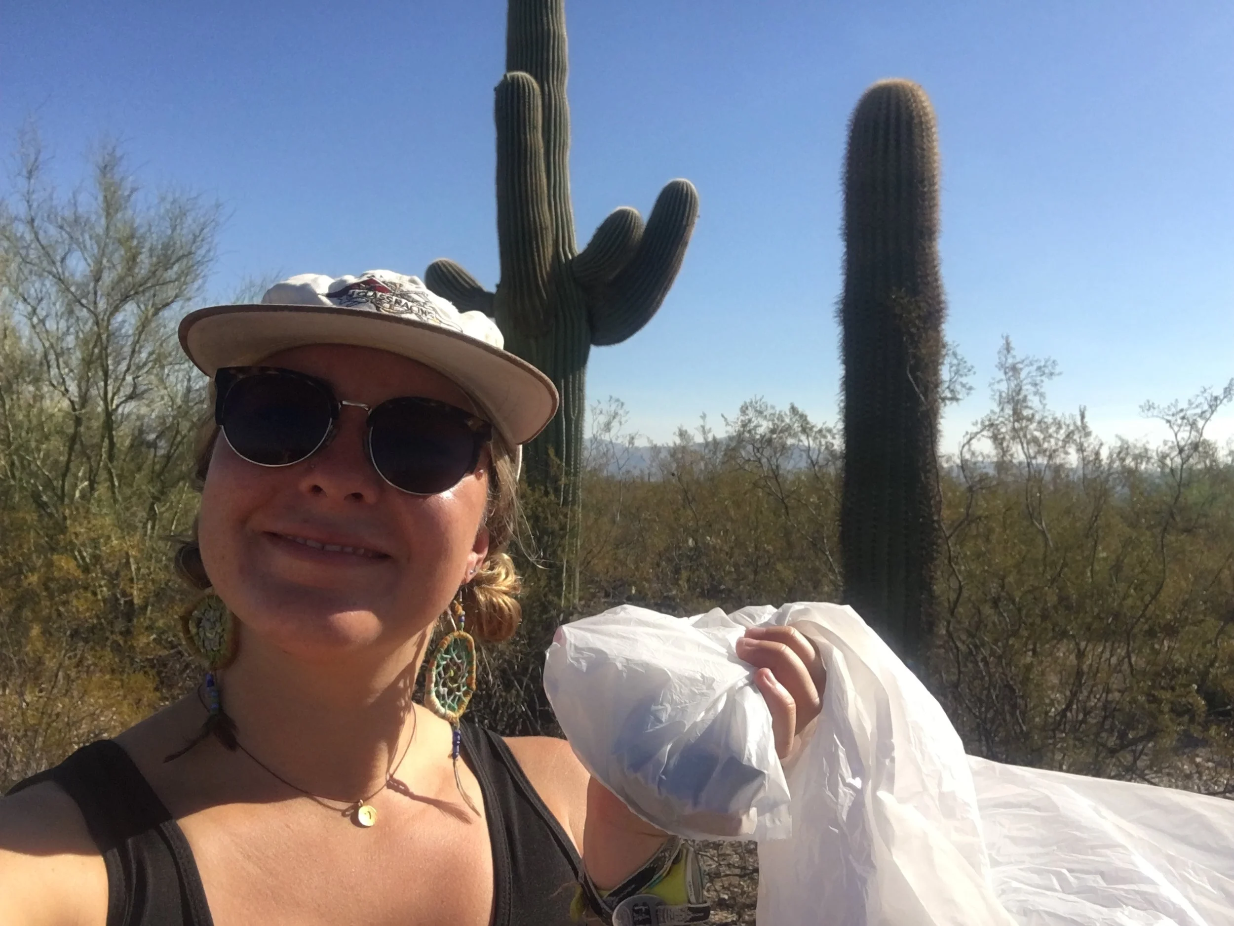 Weird smile but LOOK HOW TINY MY LIL BAG O TRASH IS!!