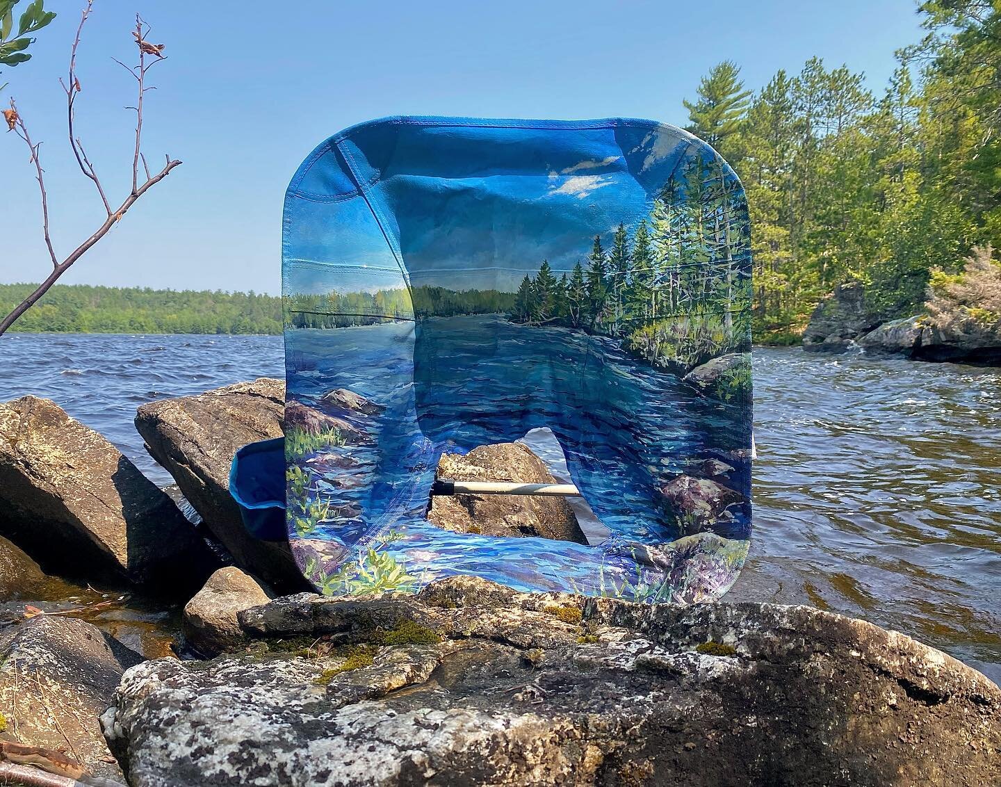 &ldquo;Out There Camp Chair&rdquo; acrylic on camp chair with cute hole in it I found while paddling a month ago on a forest service island. 

Boated this baby out, brought her to my studio, painted her up, and then this weekend canoed 3 miles back o