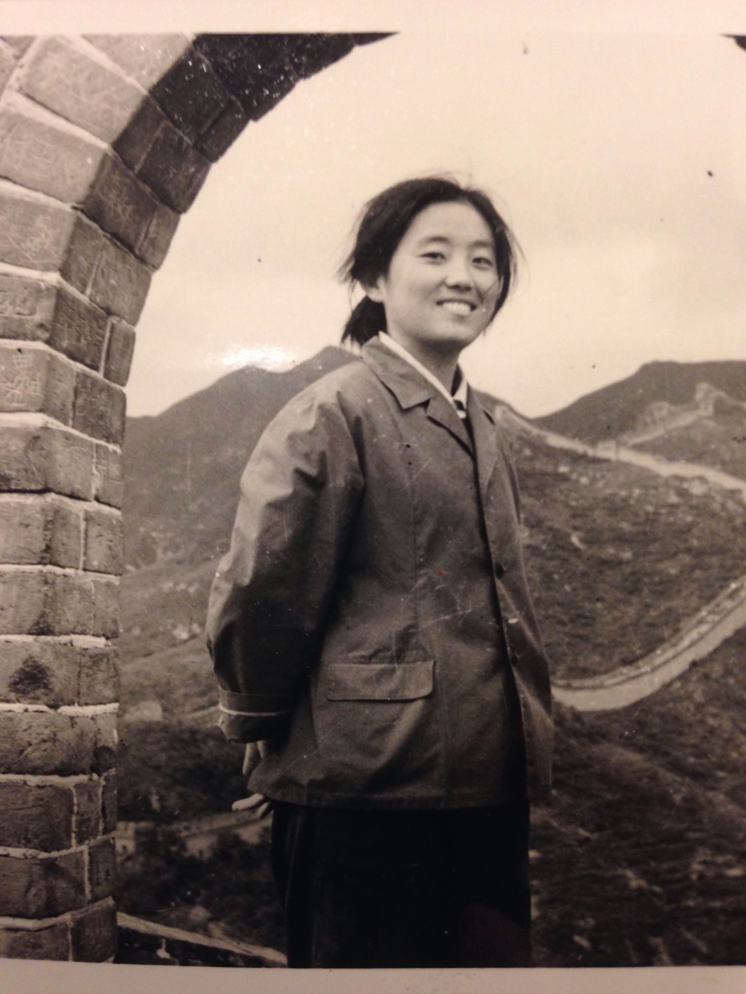  Elena's mom in Mao-era China, standing on the Great Wall. Image courtesy the author.&nbsp; 
