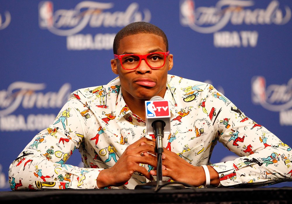 Westbrook at a press conference after Game 1 of the 2012 Finals, wearing a Prada shirt and lensless, plastic glasses. Image  via GQ .&nbsp; 