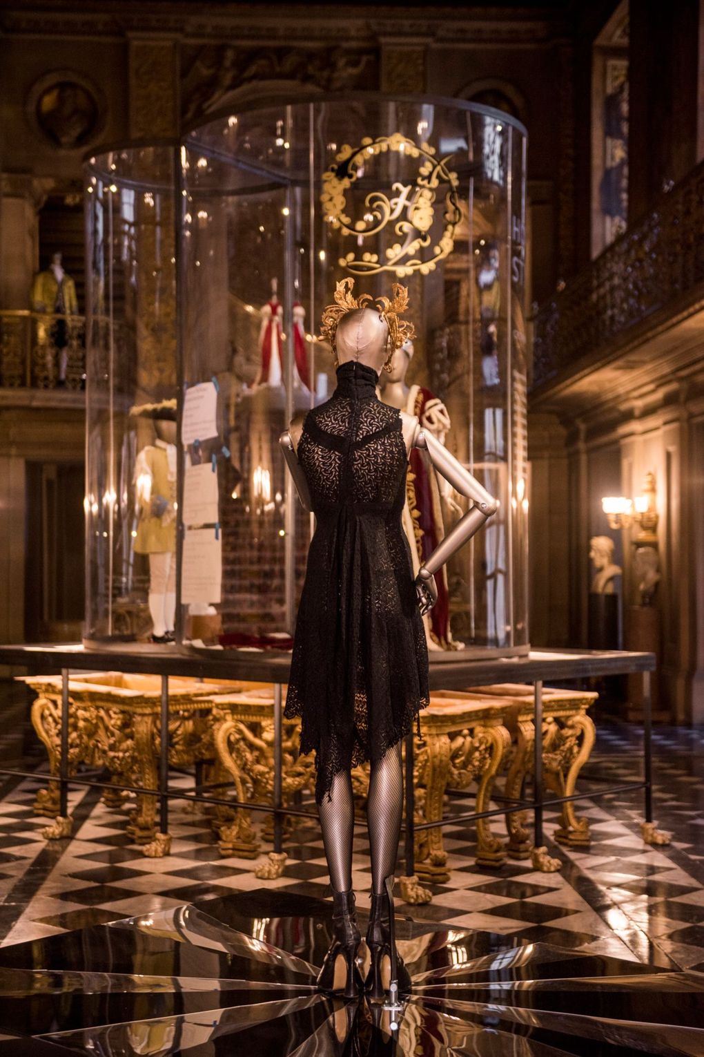  An Alexander McQueen dress worn by Stella Tennant in British Vogue is displayed in The Painted Hall at Chatsworth House. Image courtesy of Chatsworth Trust. 